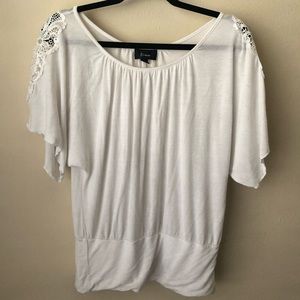 White dressy top with lace shoulder and round neck